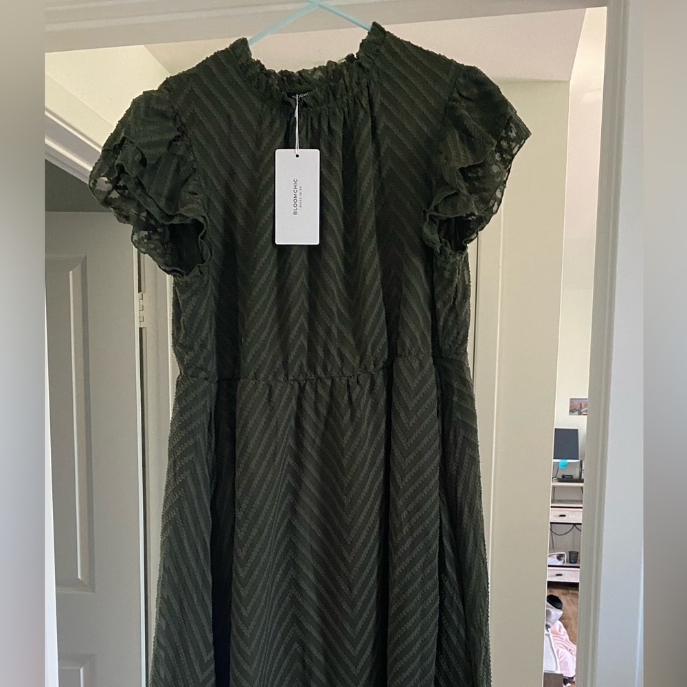 Army green dress. Beautiful material and great quality.